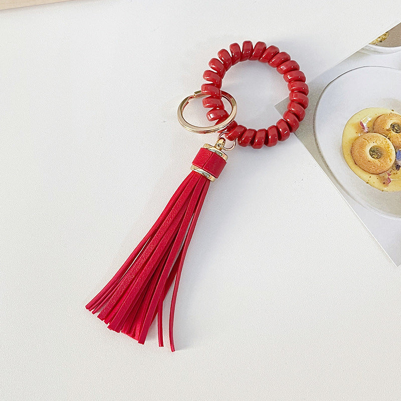 Brazalete al por mayor cable PU Leopardo Tassel Anti-Lost Keychains